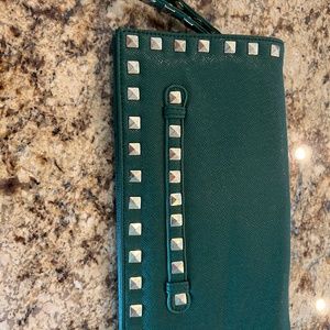 Sondra Roberts studded clutch wristlet green with gold tone pyramid studs